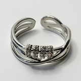 Triple Crossover Pave Ring