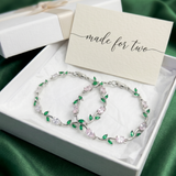 Two Silver Bracelets with floral design in a box with 'made for two' card