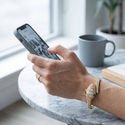 Woman wearing Ivory Serpentyne crystal bangle watch on wrist