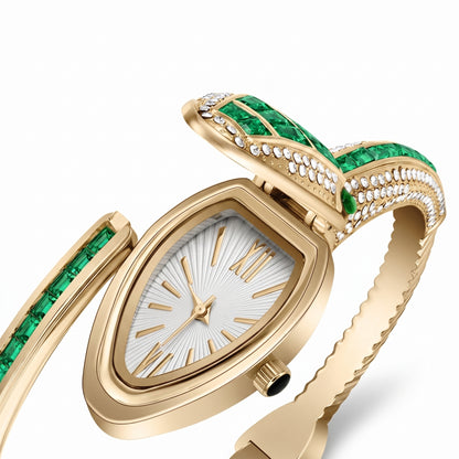 Emerald Serpentyne watch face close-up with emerald baguette stones