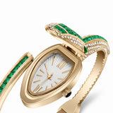 Emerald Serpentyne watch face close-up with emerald baguette stones